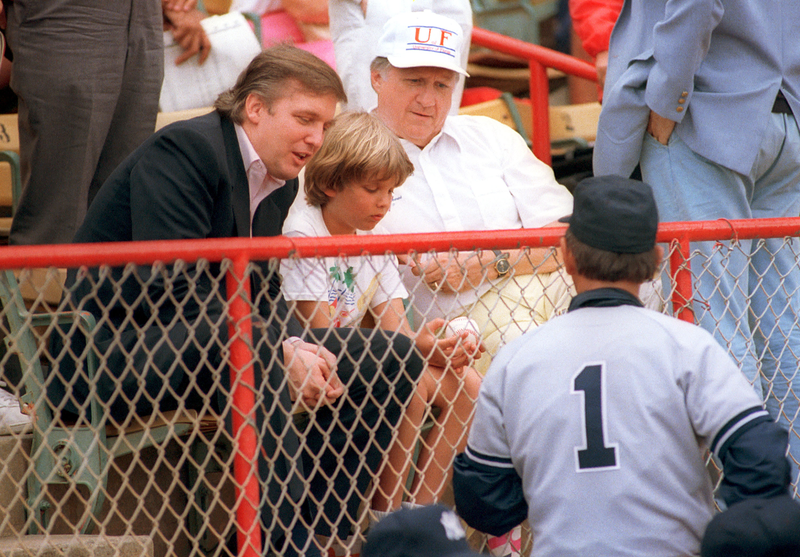 Donald Trump takes in a game in 1988. Photo credit: Marty Lederhandler/AP